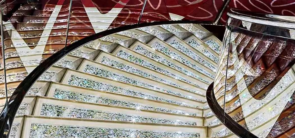 2- THE SWAROVSKI CRYSTAL STAIRCASE <br> THE MOST GLAMOROUS STAIRCASE AT SEA