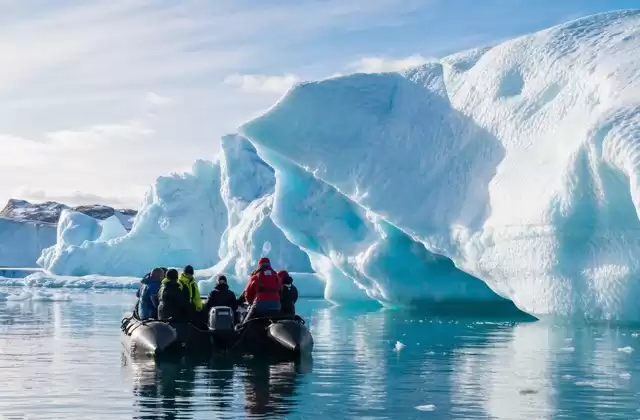 Take a Zodiac among the icebergs
